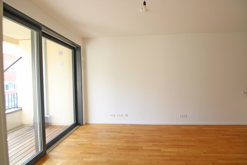 Wohnzimmer mit offener Küche