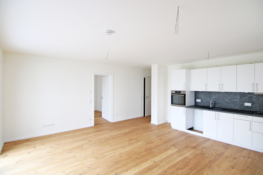 Großes Wohnzimmer/offene Küche