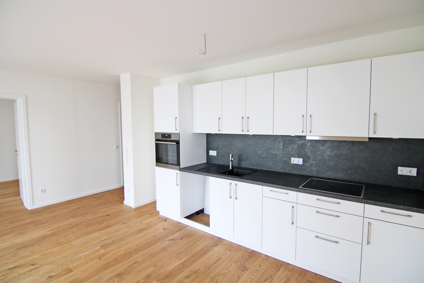 Großes Wohnzimmer/offene Küche