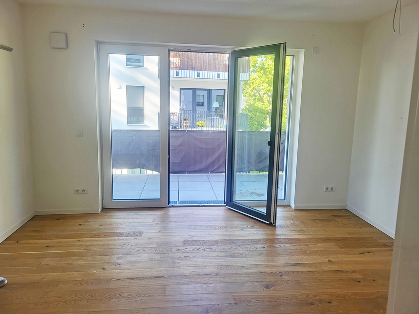 Wohnzimmer mit Balkon