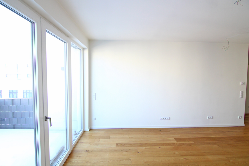 Wohnzimmer mit offener Küche